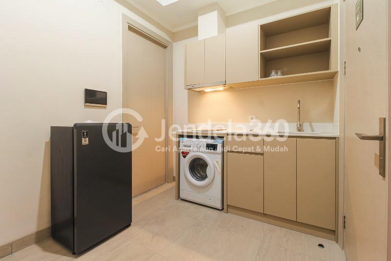 Living Room 1BR Apartment with City View at Menara Jakarta Apartment