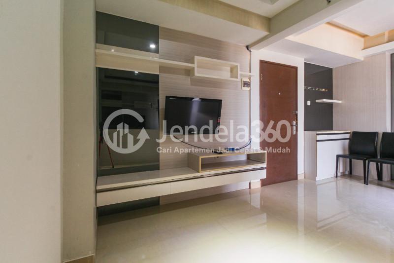 Living Room 1BR Puri Park View Apartment at Tower E