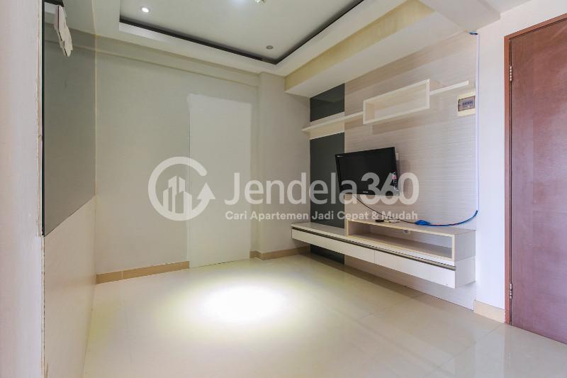 Living Room 1BR Puri Park View Apartment at Tower E