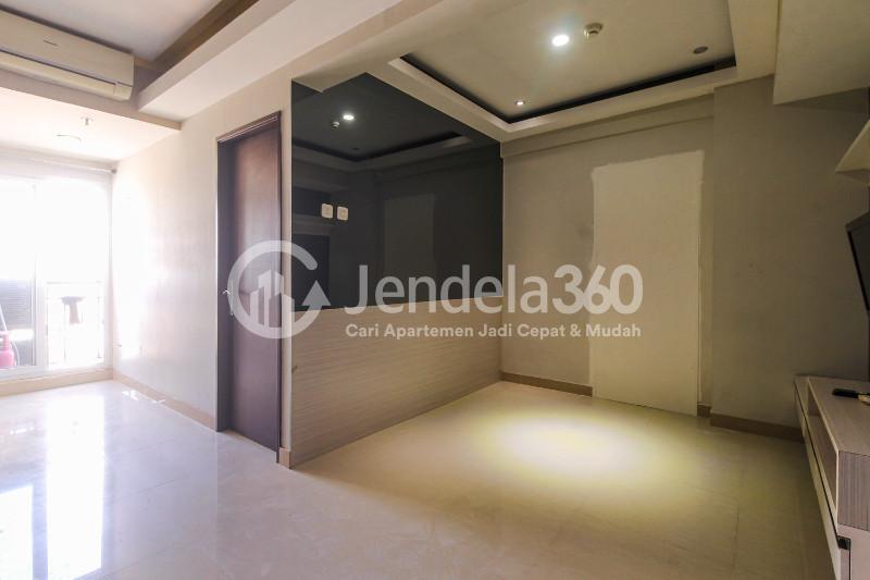 Living Room 1BR Puri Park View Apartment at Tower E