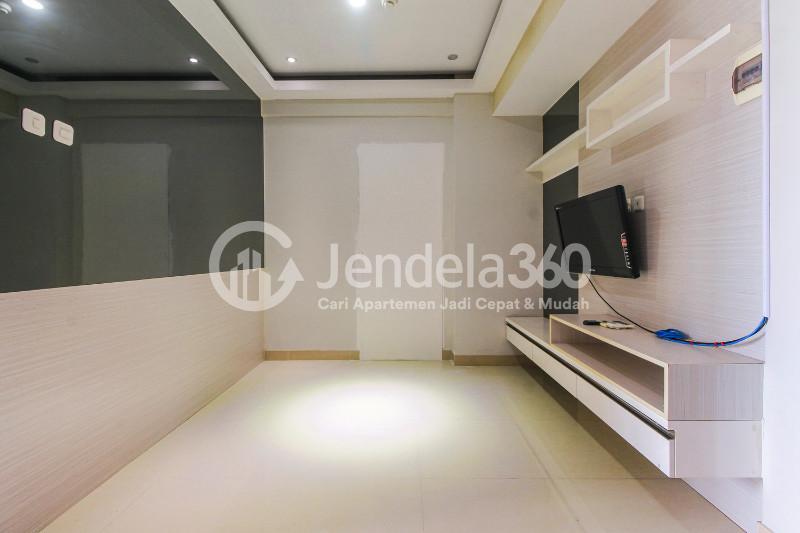 Living Room 1BR Puri Park View Apartment at Tower E