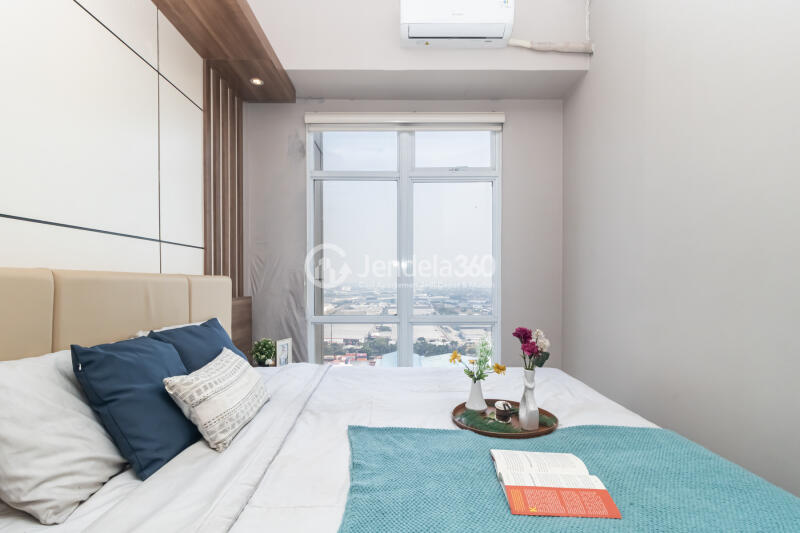 Bedroom Fancy 1BR Apartment at Vasanta Innopark Apartment Low Floor