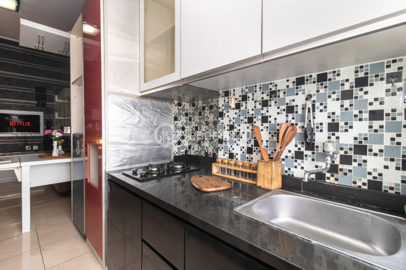 Kitchen 2BR Apartment with City View at Season City Apartment