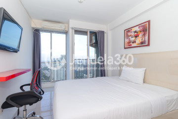 Bedroom High Floor Studio Apartment with  View at Tifolia Apartment