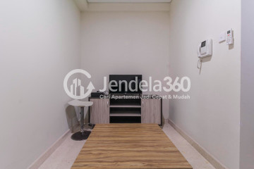 Living Room High Floor 1BR Apartment with Swimming Pool View at Puri Orchard Apartment