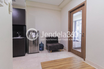 Living Room High Floor 1BR Apartment with Swimming Pool View at Puri Orchard Apartment