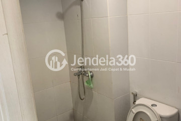 Bathroom Studio Apartment with Swimming Pool View at Patraland Urbano Apartment