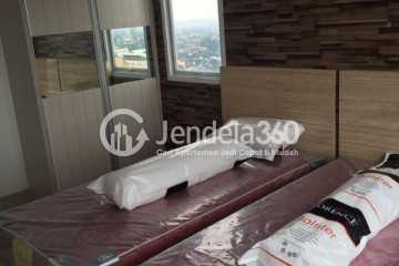 Bedroom Cozy 1BR Apartment High Floor with City View at Taman Melati Margonda Apartment