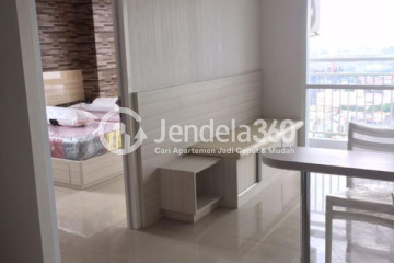 Living Room Cozy 1BR Apartment High Floor with City View at Taman Melati Margonda Apartment