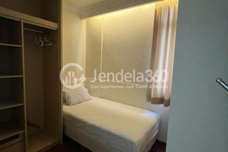 Bedroom 2 Tidy 2BR Apartment Middle Floor with City View at Kuningan Place Apartment
