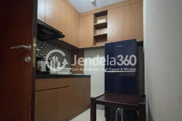 Kitchen Cozy 2BR Apartment High Floor with City View at Taman Melati Margonda Apartment