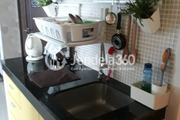 Kitchen Restful 2BR Apartment at Sky Terrace Apartment Middle Floor