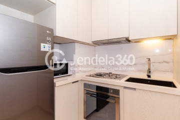 Kitchen Lovely 1BR Apartment at Izzara Apartment Middle Floor