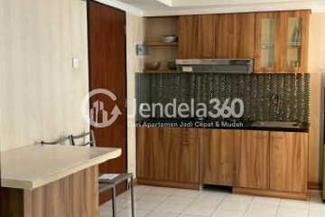 Kitchen Well Furnished 2BR Apartment Middle Floor with City View at Kebagusan City Apartment