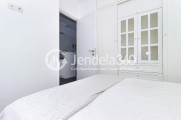 Bedroom 1 High Floor 2BR Apartment with  View at Green Pramuka City Apartment