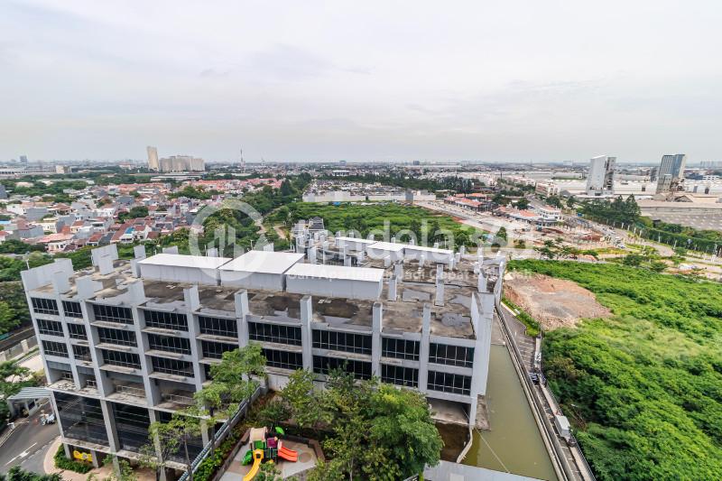 Balcony Low Floor Studio Apartment with City View at Sedayu City Apartment