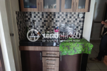 Kitchen 1BR Apartment with City View at Mutiara Bekasi Apartment