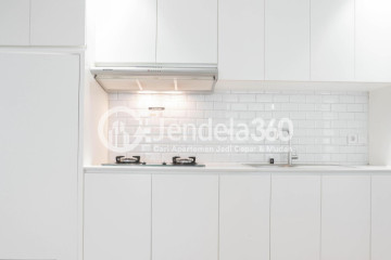 Kitchen Middle Floor 2BR Apartment with City View at Gardenia Boulevard Apartment