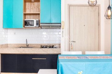 Kitchen 2BR Apartment with Swimming Pool View at Elpis Residence Apartment