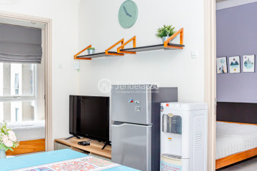 Living Room 2BR Apartment with Swimming Pool View at Elpis Residence Apartment