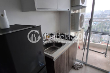 Kitchen Peaceful 1BR Apartment Middle Floor with  View at Vittoria Residence