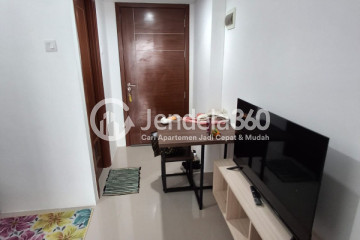 Living Room Peaceful 1BR Apartment Middle Floor with  View at Vittoria Residence