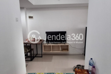 Living Room Peaceful 1BR Apartment Middle Floor with  View at Vittoria Residence