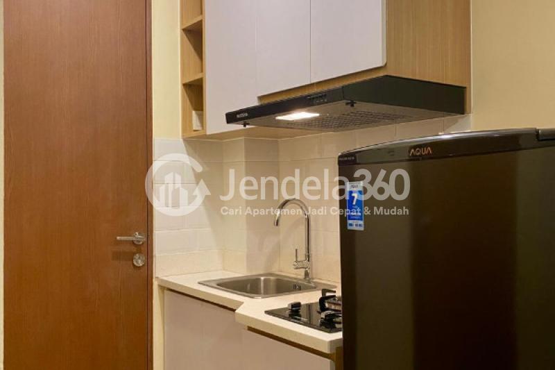 Kitchen Restful Studio Apartment Low Floor with  View at Tifolia Apartment