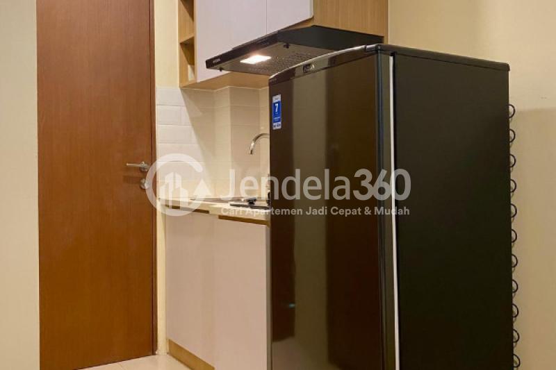 Kitchen Restful Studio Apartment Low Floor with  View at Tifolia Apartment