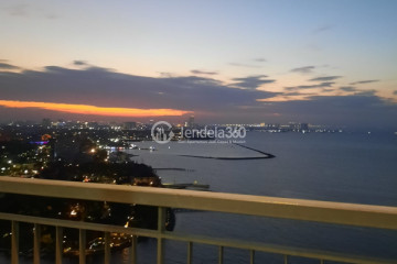 Balcony Relaxed Studio Apartment High Floor with City View at Ancol Mansion Apartment