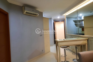 Living Room Relaxed Studio Apartment High Floor with City View at Ancol Mansion Apartment