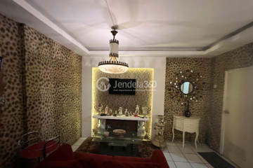 Living Room Fancy 2BR Apartment at Modernland Golf Apartment Tower Biru