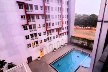 Balcony Elegant Studio Apartment Low Floor with City View at Monroe Jababeka Apartment