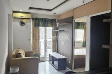 Living Room Decorative 2BR Apartment at Mutiara Bekasi Apartment Low Floor