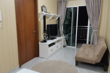 Living Room Affordable 1BR Apartment High Floor with  View at Condominium Green Bay Pluit SeaView