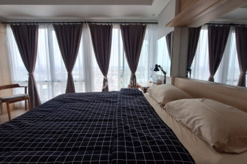 Bedroom Lovely 1BR Apartment at Altiz Apartment Tower Lower Tower