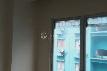 Bedroom Compact 2BR Apartment at City Park Apartment Middle Floor