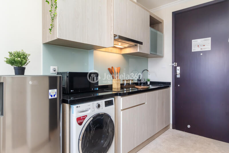 Kitchen Lovely Studio Apartment Low Floor with City View at Menteng Park