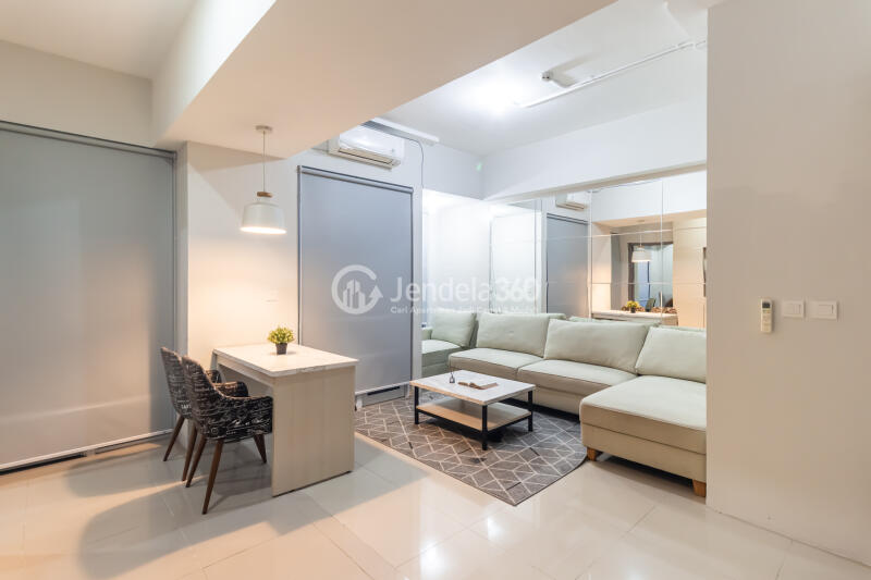Living Room 1BR Apartment with City View at Vasanta Innopark Apartment