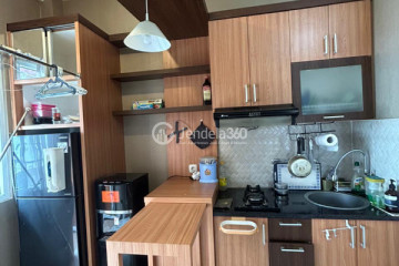 Kitchen 1BR Apartment with City View at Green Pramuka City Apartment