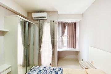 Bedroom Peaceful Studio Apartment at Transpark Cibubur Apartment Tower Aurora