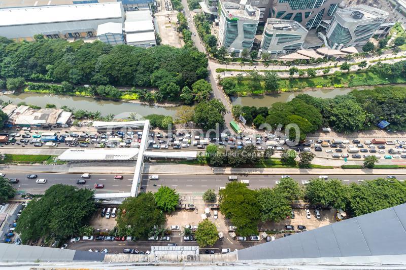 Balcony High Floor Studio Apartment with City View at Tifolia Apartment