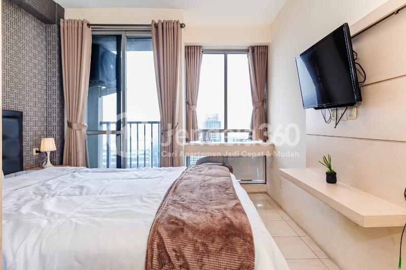 Bedroom High Floor Studio Apartment with City View at Tifolia Apartment