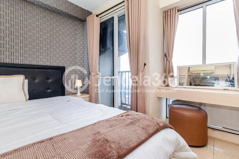 Bedroom High Floor Studio Apartment with City View at Tifolia Apartment