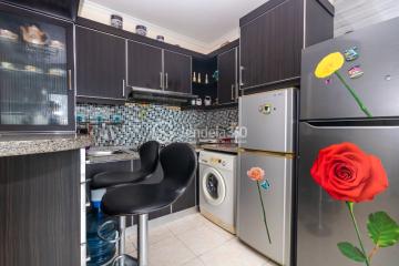 Kitchen Middle Floor 2BR Apartment with City View at MOI City Home