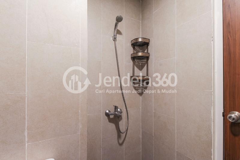 Bathroom Cozy Studio Apartment with Direct Access to Universitas Indonesia Train Station at Taman Melati Margonda Apartment