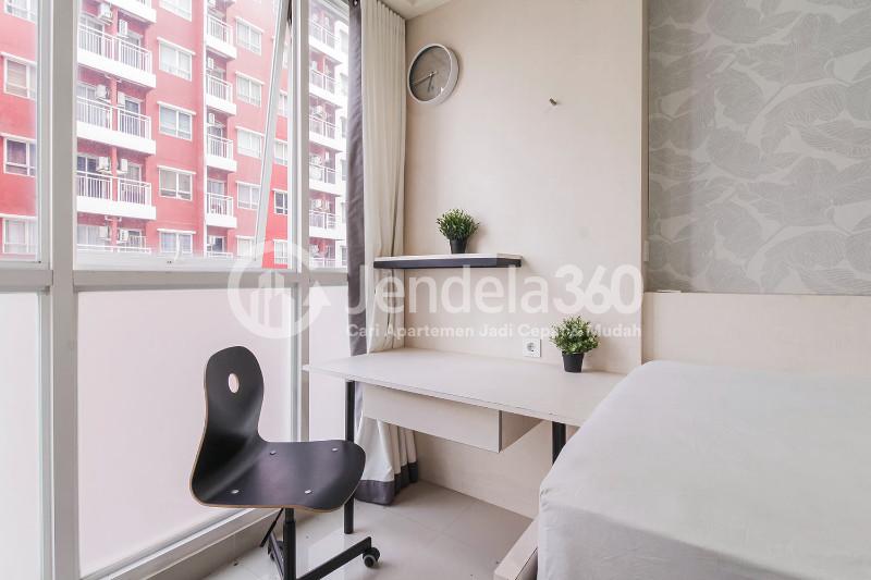 Bedroom Cozy Studio Apartment with Direct Access to Universitas Indonesia Train Station at Taman Melati Margonda Apartment