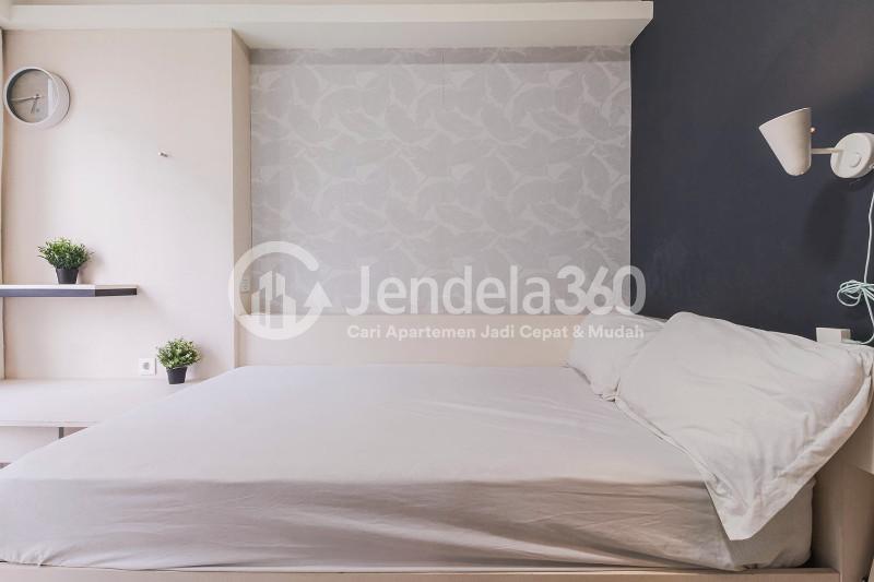 Bedroom Cozy Studio Apartment with Direct Access to Universitas Indonesia Train Station at Taman Melati Margonda Apartment