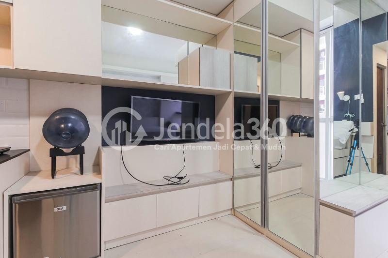 Bedroom Cozy Studio Apartment with Direct Access to Universitas Indonesia Train Station at Taman Melati Margonda Apartment
