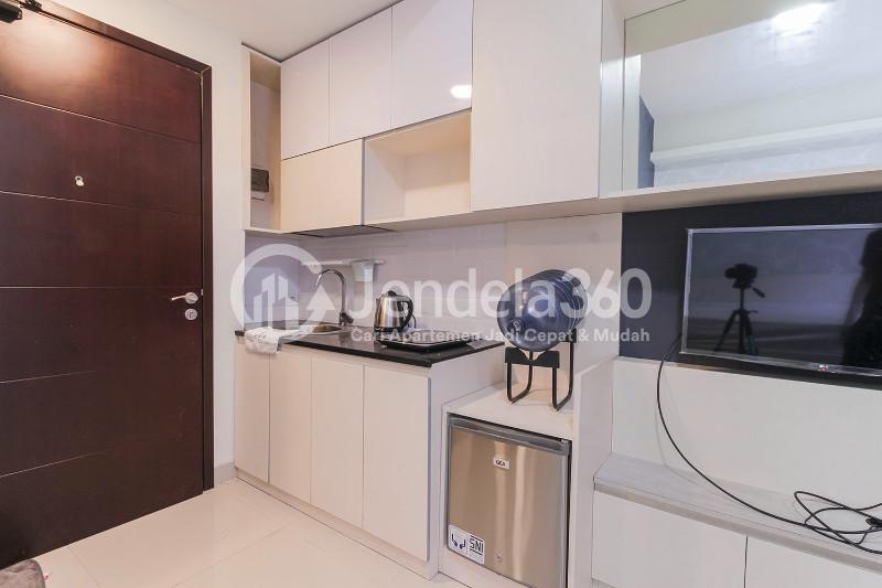 Kitchen Cozy Studio Apartment with Direct Access to Universitas Indonesia Train Station at Taman Melati Margonda Apartment